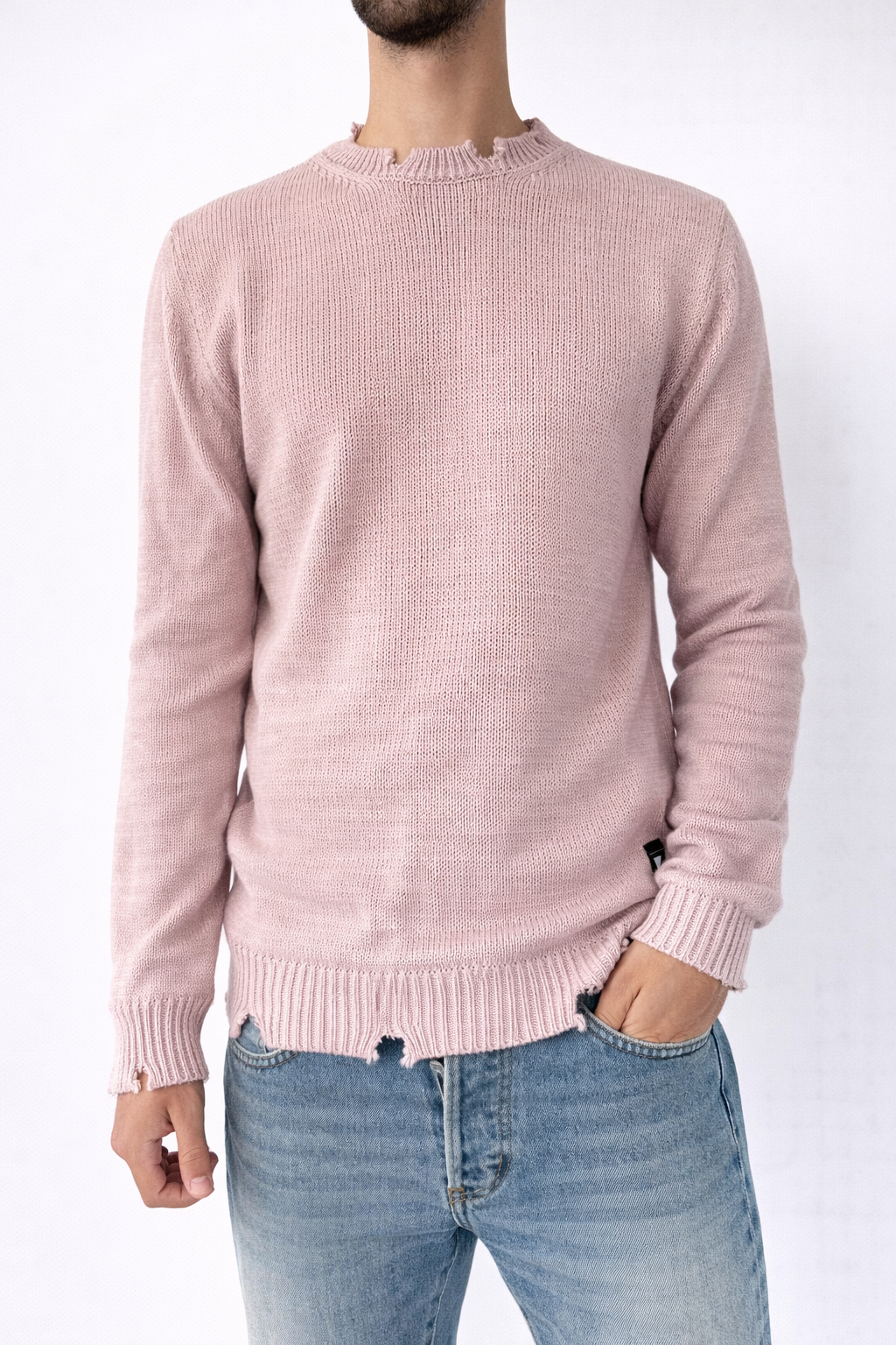 MAGLIONE DAMAGE TINTA UNICA CON DETTAGLI POLSI
