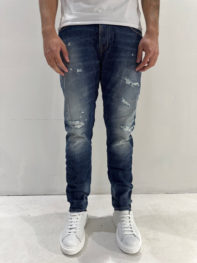 JEANS SLIM FIT LAVAGGIO SCURO CON SABBIATURA