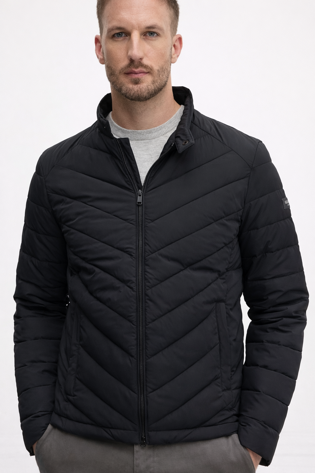 PIUMINO GUESS 100 GRAMMI