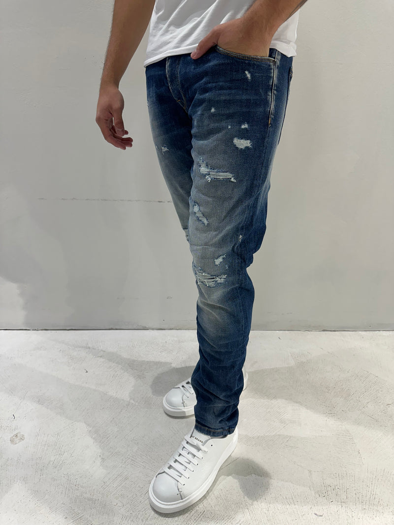 JEANS SLIM FIT LAVAGGIO SCURO CON SABBIATURA