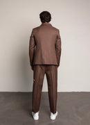 Abito doppiopetto con bottoni gioiello